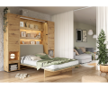 Półkotapczan BED CONCEPT  z tapicerowanym zagłówkiem w kolorze beżowym.