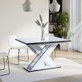 Aranżacja stołu nowoczesnego KAO biały połysk z czarnymi obrzeżami złożonego.